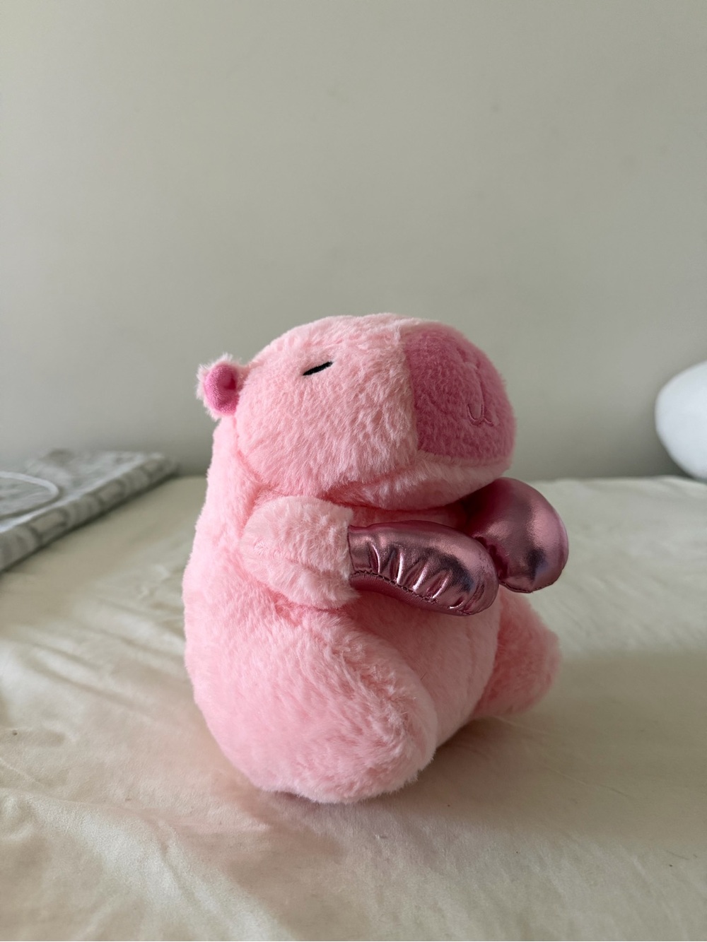 Pink capybara boxing plush